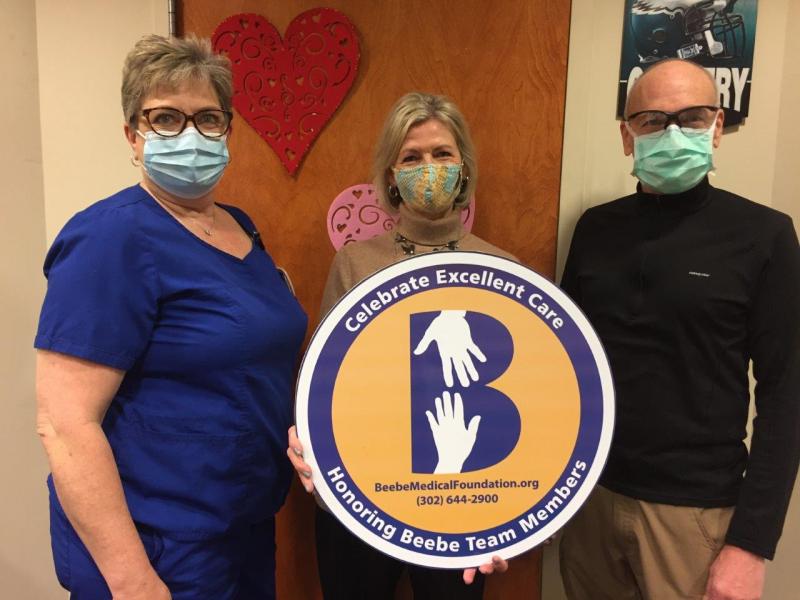 Beebe Health Sciences Librarian Jean Winstead, center, celebrates the excellent care - and unexpected diagnosis - she received from Dr. James Spellman and Mary Spradlin, his nurse. Shown are (l-r) Spradlin, Winstead and Spellman. SUBMITTED PHOTO